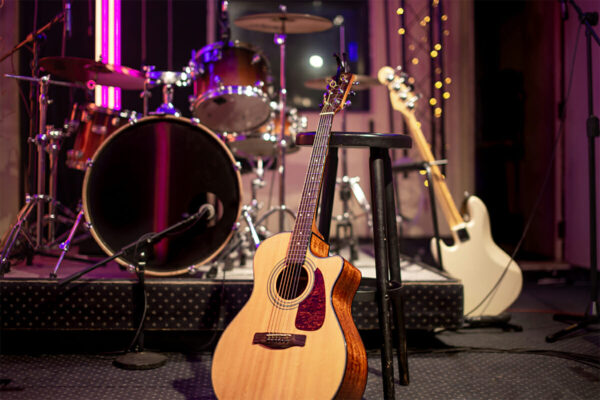 acoustic-guitar-on-the-background-of-a-recording-s-N53QKT4 Backline gear rental from Cadence Studios
