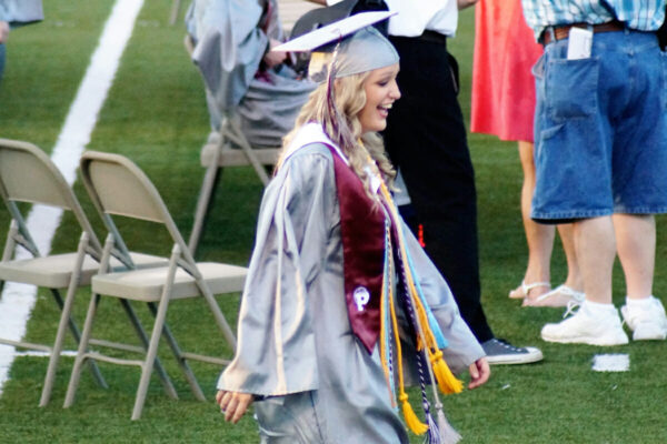 happy-graduate-walking-toward-the-stage-to-receive-her-diploma-nominated-and-greatly-appreciated_t20_1QQ3wx Live Streaming by Cadence Studios | Event Production & Marketing in Sherman, TX